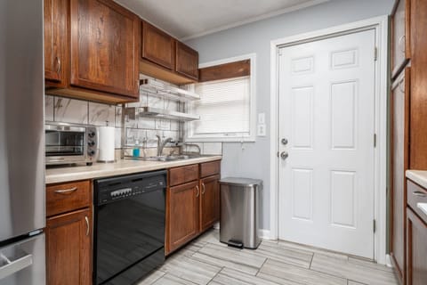 Kitchen Area | Toaster Over | Washing Machine | Dishes and Utensils Provided