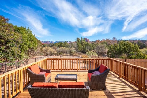 Private deck with BBQ and fully-fenced backyard.