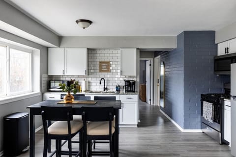 Seamlessly move between the dining area and kitchen with convenient accessibility