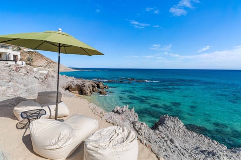 On the beach, sun loungers, beach towels