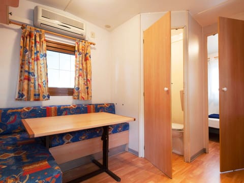 Sky, Table, Daytime, Furniture, Property, Cloud, Nature, Chair, Building, Outdoor Furniture