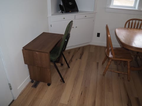 DINING AREA:  There is also a work desk next to the dining area.
