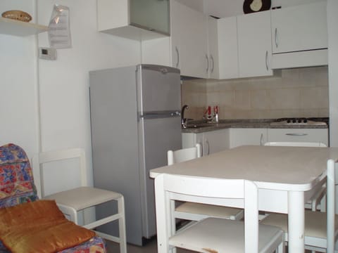 Fridge, microwave, coffee/tea maker, highchair