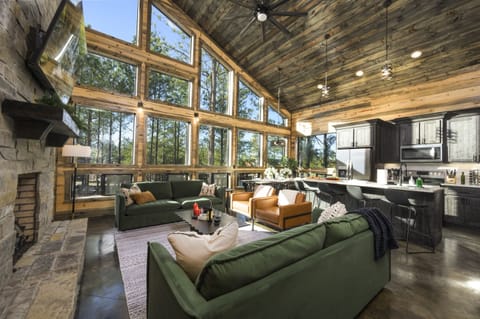 Stunning floor-to-ceiling windows, framing breathtaking sunrise and sunset views