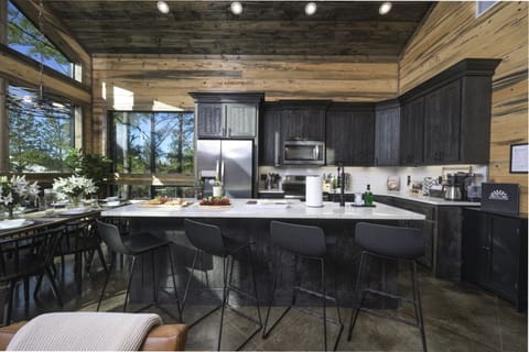 Come appreciate the craftsman beauty of our well-appointed and fully stocked kitchen