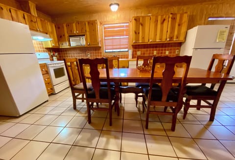 Villa Muniz - Large kitchen, well stocked, with 2 refrigerators, 2 dining tables and cedar cabinets.