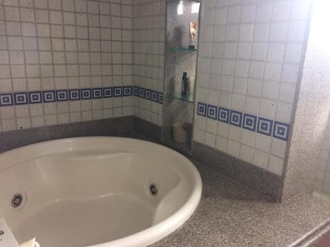 Jetted tub, hair dryer, towels, soap