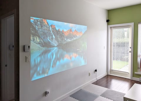 Projector for movies. Bring your own laptop. HDMI is provided. Bedroom to left.