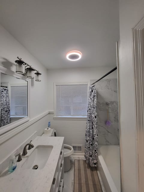 Combined shower/tub, hair dryer, towels, soap