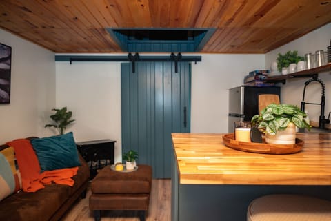 Rustic touches and modern comforts blend perfectly in your tiny cabin getaway.