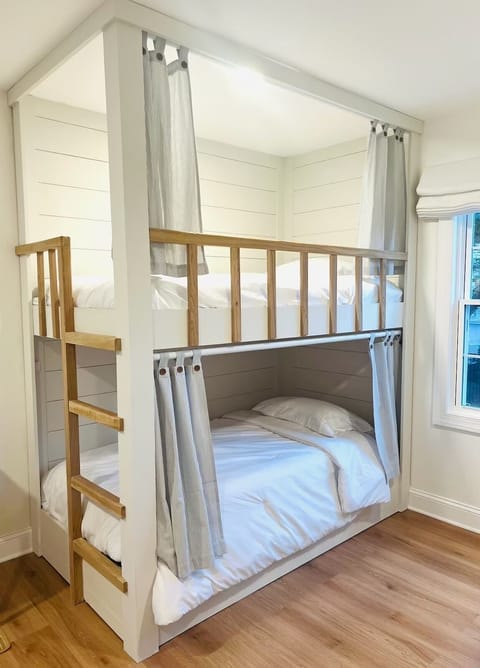 Two sets of identical twin bunk beds (one set shown here)