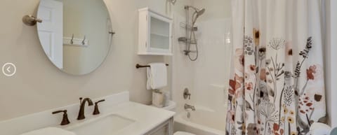 Combined shower/tub, hair dryer, towels, soap