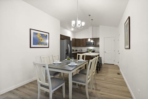 kitchen has utensils, pots & pans. Coffee maker, coffee, cream & sugar.