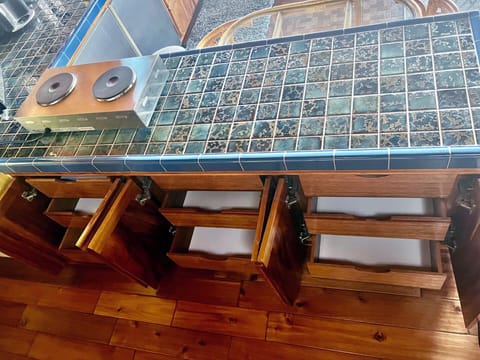 Three sets of three drawers for the built-in dresser.