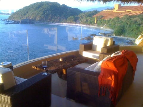 Veranda with square table for 4, swim chair, 2 individual chairs and love sear