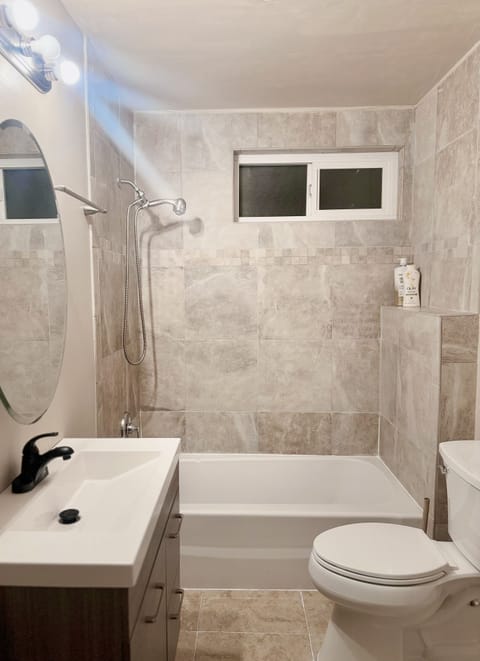 Combined shower/tub, hair dryer, towels, shampoo