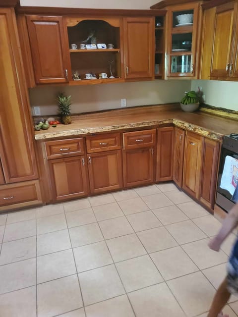 Fully stocked kitchen with coffee station , smoothie blender and cooking utensal