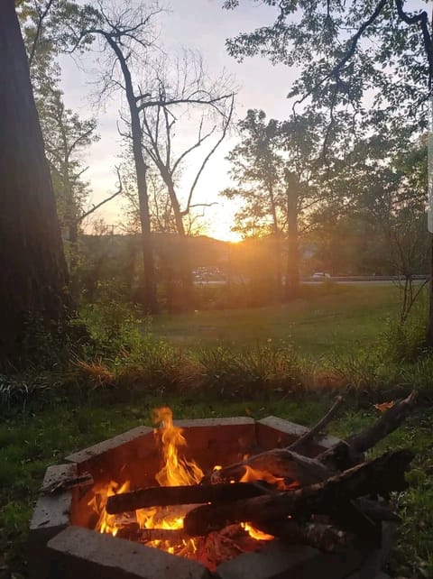 Outdoor Fire pit with Sunset over Ryan's Creek House
