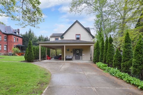 Beautiful home exterior with picnic-ready outdoor seating space.