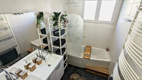 Combined shower/tub, hair dryer, towels, soap