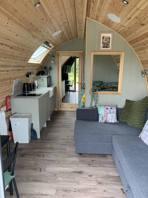 Living area with Smart TV and sofa bed for children