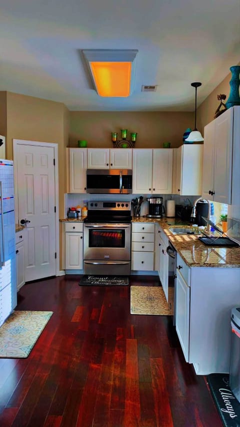 Kitchen with coffee maker, airfryer, and toaster oven