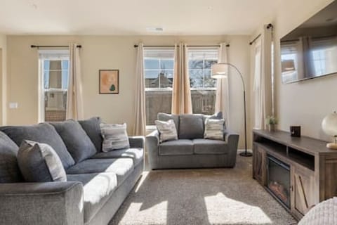 Lounge by the fireplace in our roomy living area while playing games or watching movies on our Smart TV.