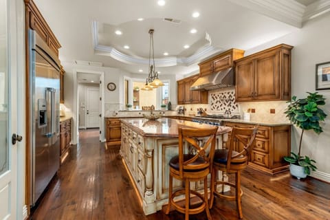 Large kitchen with walk in pantry.