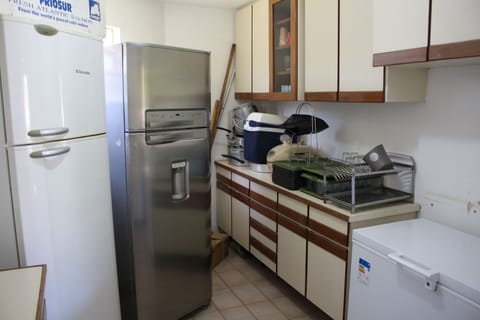 Fridge, stovetop, cookware/dishes/utensils