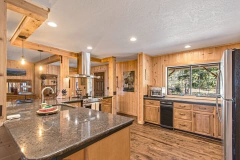 Kitchen is equipped with a gas range