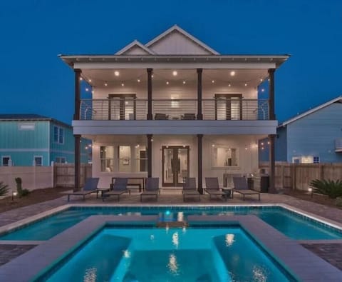 Beautiful resort-style backyard with private pool, hot tub, fire table, golf!