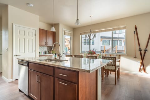 Kitchen island with double sink and beautiful fixtures