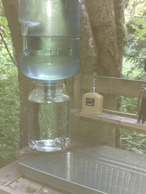 gravity fed sink water for dishes (non potable) back up jugs found behind VW