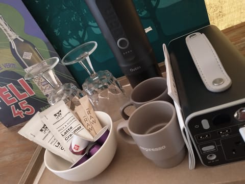 amenity bar: battery powered espresso machine and power bank for recharging