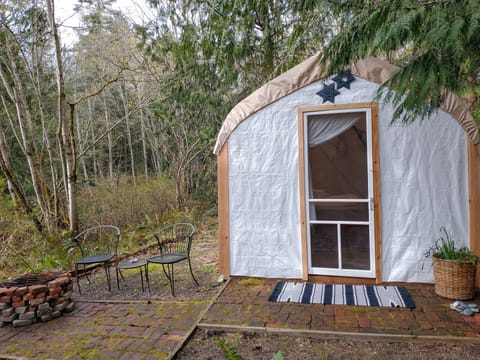 front tentalow entrance with fire ring and patio