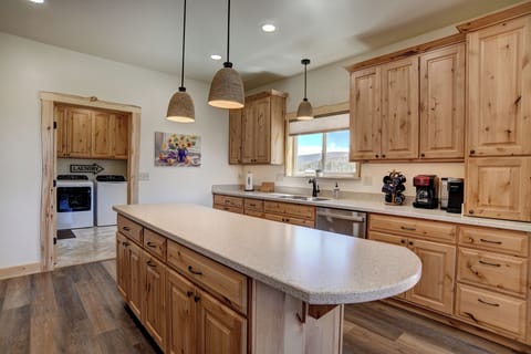 Kitchen - Mountain Aire VRC Rental Home - Our custom-built Amish cabinets, large kitchen island, mountain views from the sink. Enjoy a drip coffee maker or Keurig.