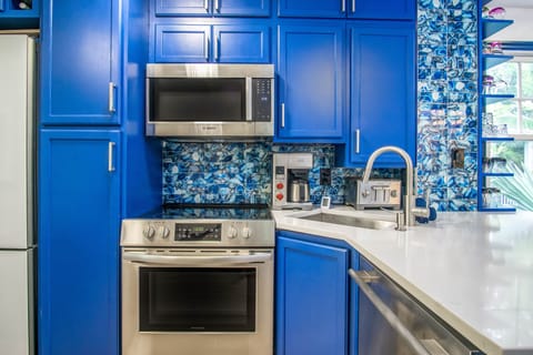 Open kitchen with updated stainless steel appliances and everything you need!