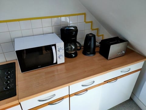 Microwave, stovetop, electric kettle, toaster