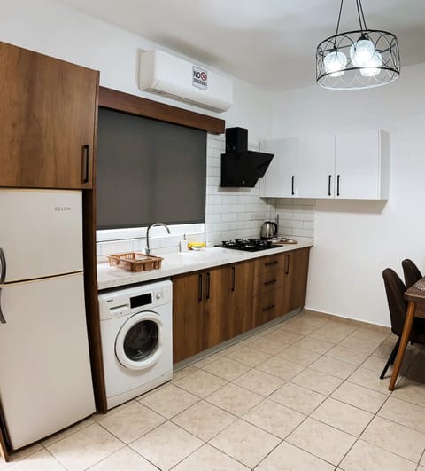 Fridge, stovetop, electric kettle, highchair