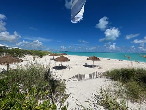 On the beach, sun loungers, beach towels