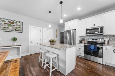 Full Kitchen with Major Appliances & Bar Seating