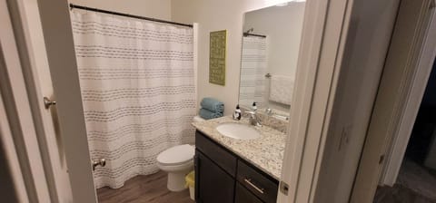 Combined shower/tub, hair dryer, towels, soap