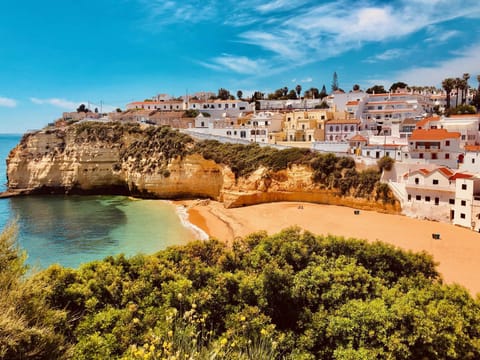 On the beach, sun loungers, beach towels