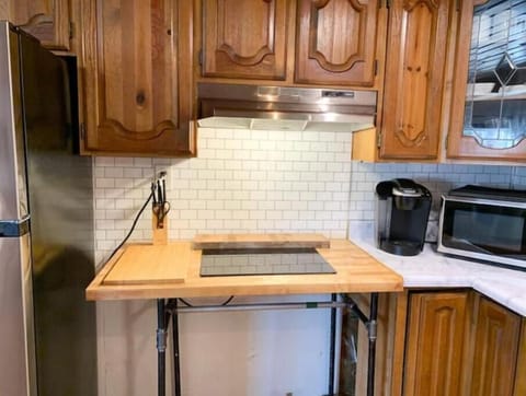 Fridge, coffee/tea maker, cookware/dishes/utensils, paper towels