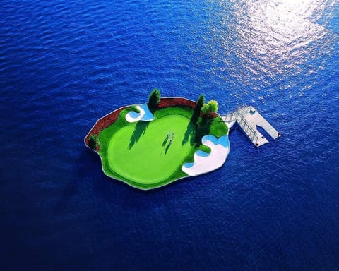 Stunning aerial perspective of Coeur d'Alene Lake's floating green.