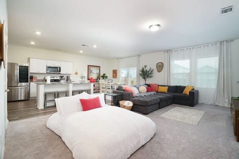 Escape to your dream vacation home, where breathtaking views and luxurious amenities await. Ideal for large gatherings, this spacious retreat boasts multiple entertainment areas, a gourmet kitchen, and a sprawling backyard perfect for outdoor festivities