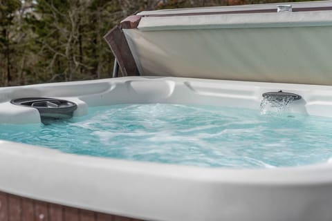 Bubbles + lake views = vacation bliss! Unwind any time in your own hot tub retreat.