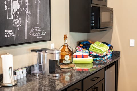Enjoy the kitchenette/bar area in the game room!