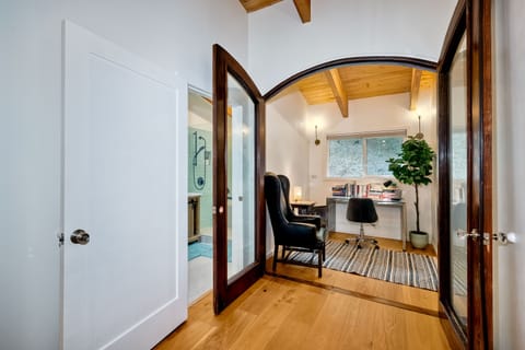 Private office with great lighting, desk, and chair