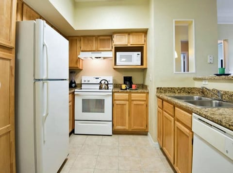 Full kitchen and cabinet space, Dishwasher and disposal.